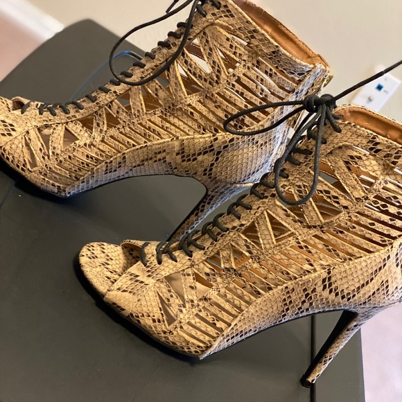 Snakeskin lace up cutout ankle booties. - Picture 1 of 2